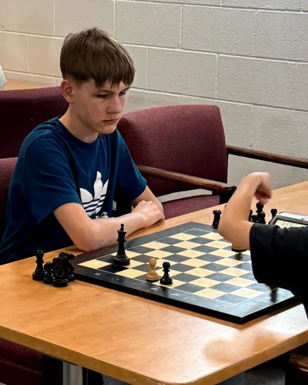 Andrii, a young chess student at WhiteKnight Academy