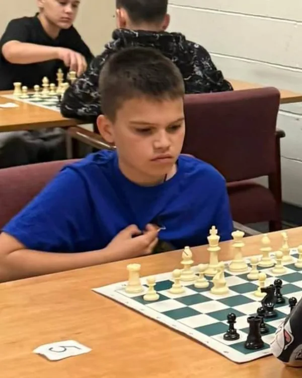 Ilya, a young chess student at WhiteKnight Academy