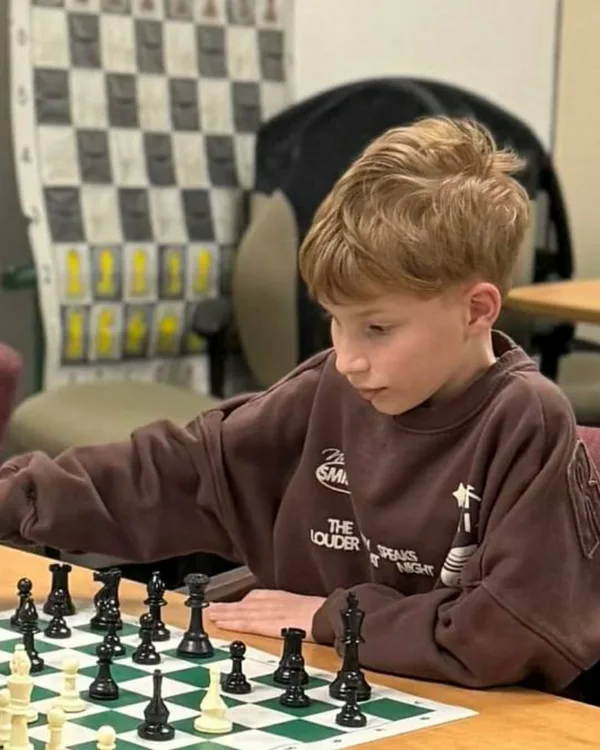 Marko, a young chess student at WhiteKnight Academy